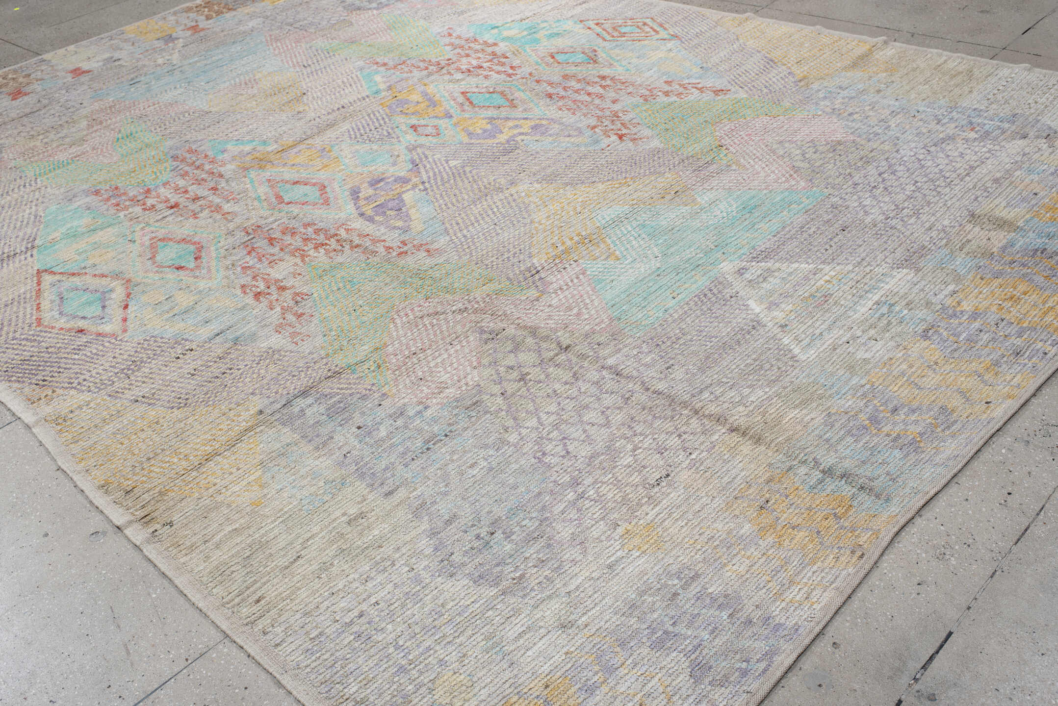 9' x 13' one-of-a-kind handmade vintage Tulu large size rug. Color palette: ivory, lavender, aqua, blush, saffron, coral