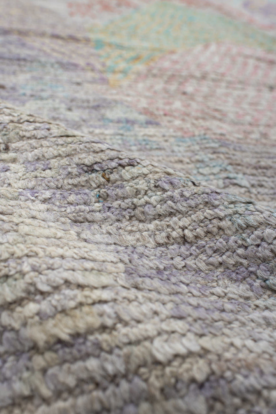 9' x 13' one-of-a-kind handmade vintage Tulu large size rug. Color palette: ivory, lavender, aqua, blush, saffron, coral