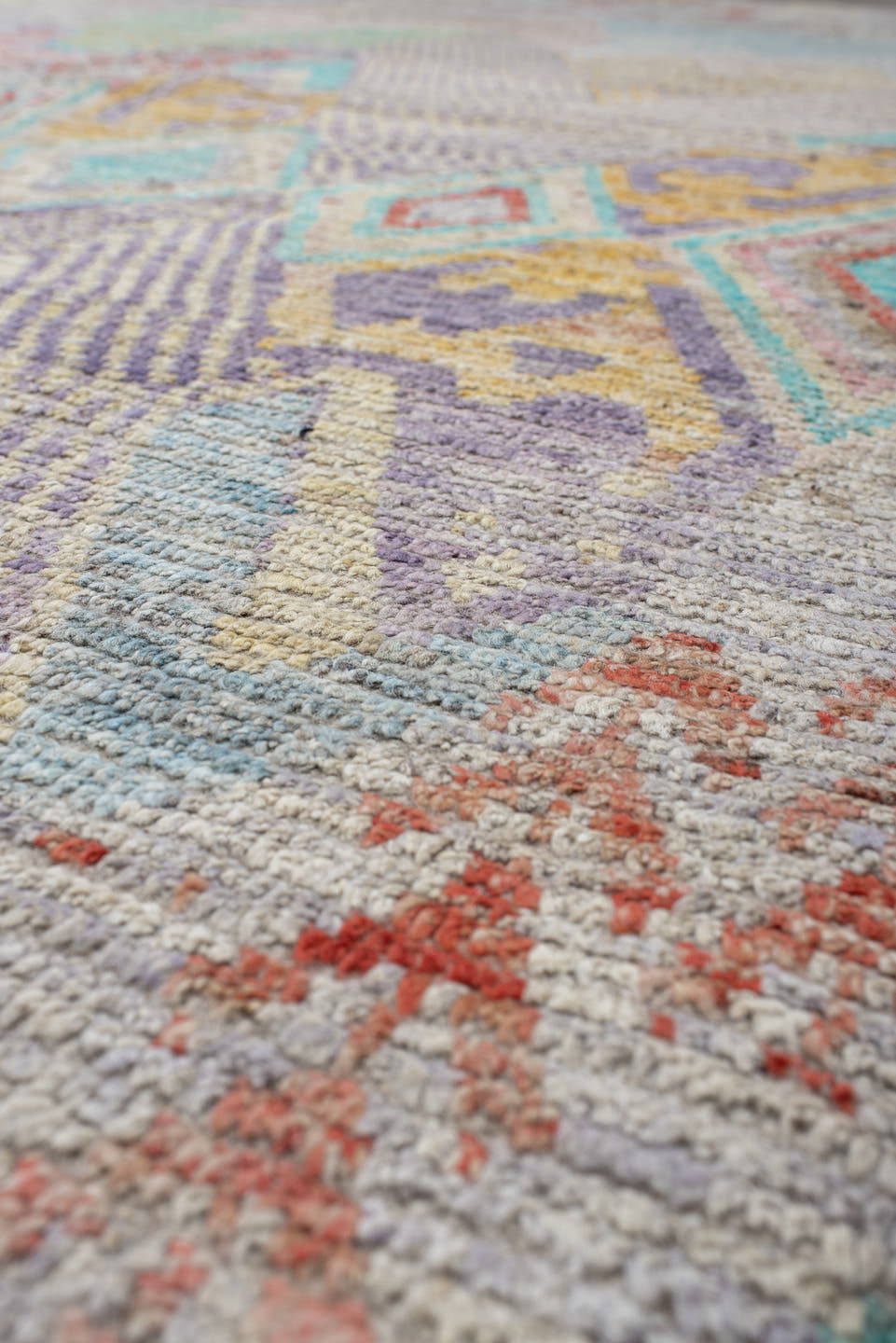 9' x 13' one-of-a-kind handmade vintage Tulu large size rug. Color palette: ivory, lavender, aqua, blush, saffron, coral