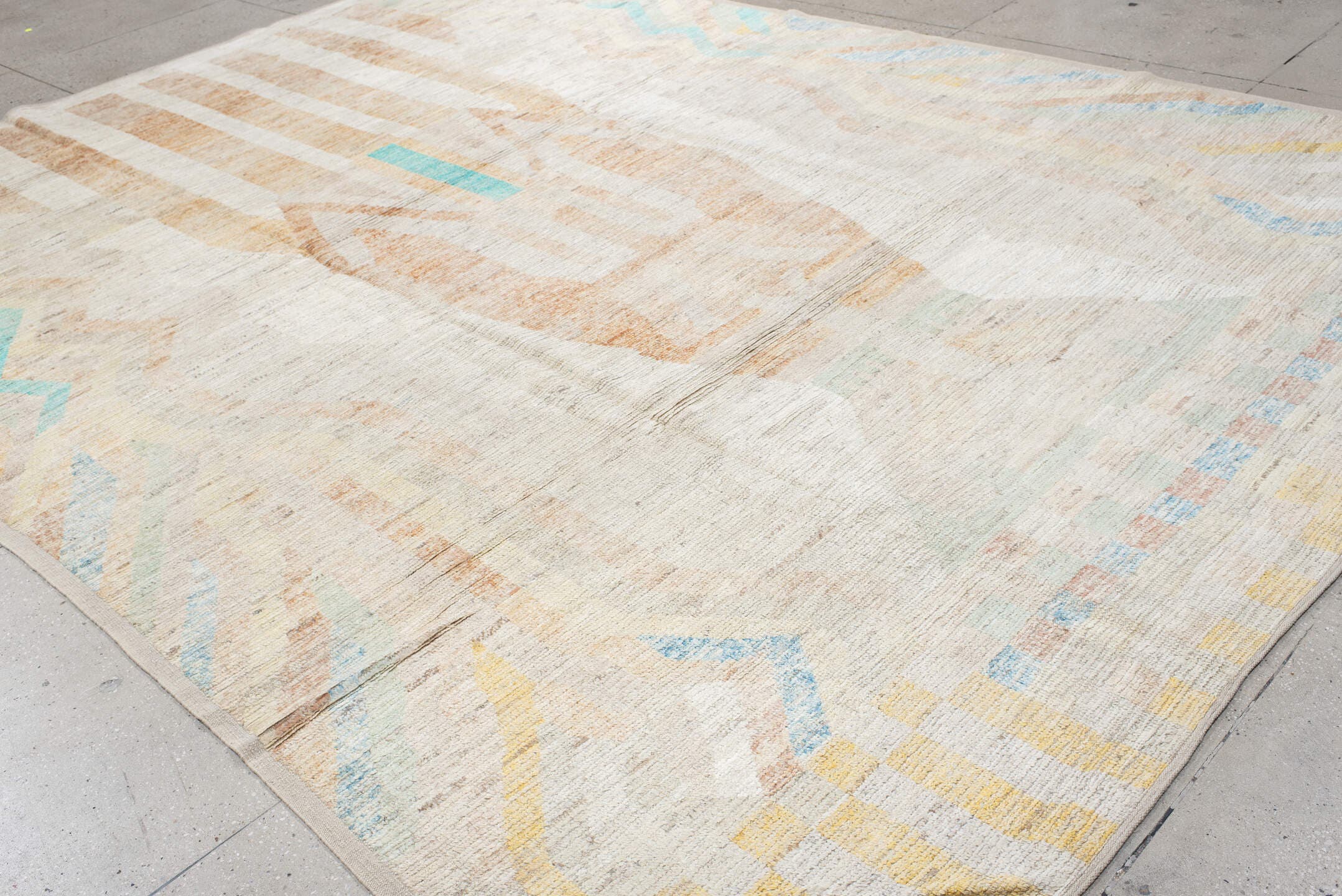 10' x 13' one-of-a-kind handmade vintage Tulu large size rug. Color palette: ivory, peach, aqua, sand, pale yellow, taupe