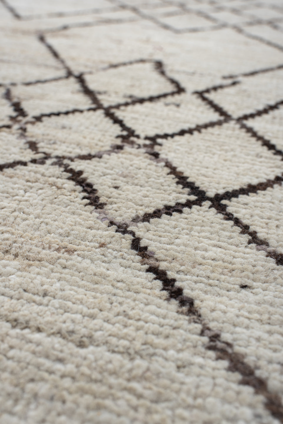 10' x 13' one-of-a-kind handmade vintage Tulu large size rug. Color palette: ivory, charcoal, taupe, cream, gray, black