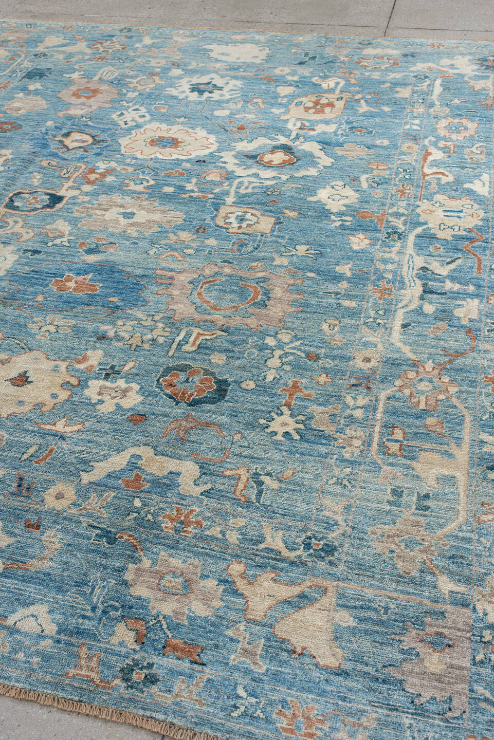 8' x 9' one-of-a-kind handmade vintage Oushak rug. Color palette: sky blue, ivory, peach, taupe, navy, slate, camel