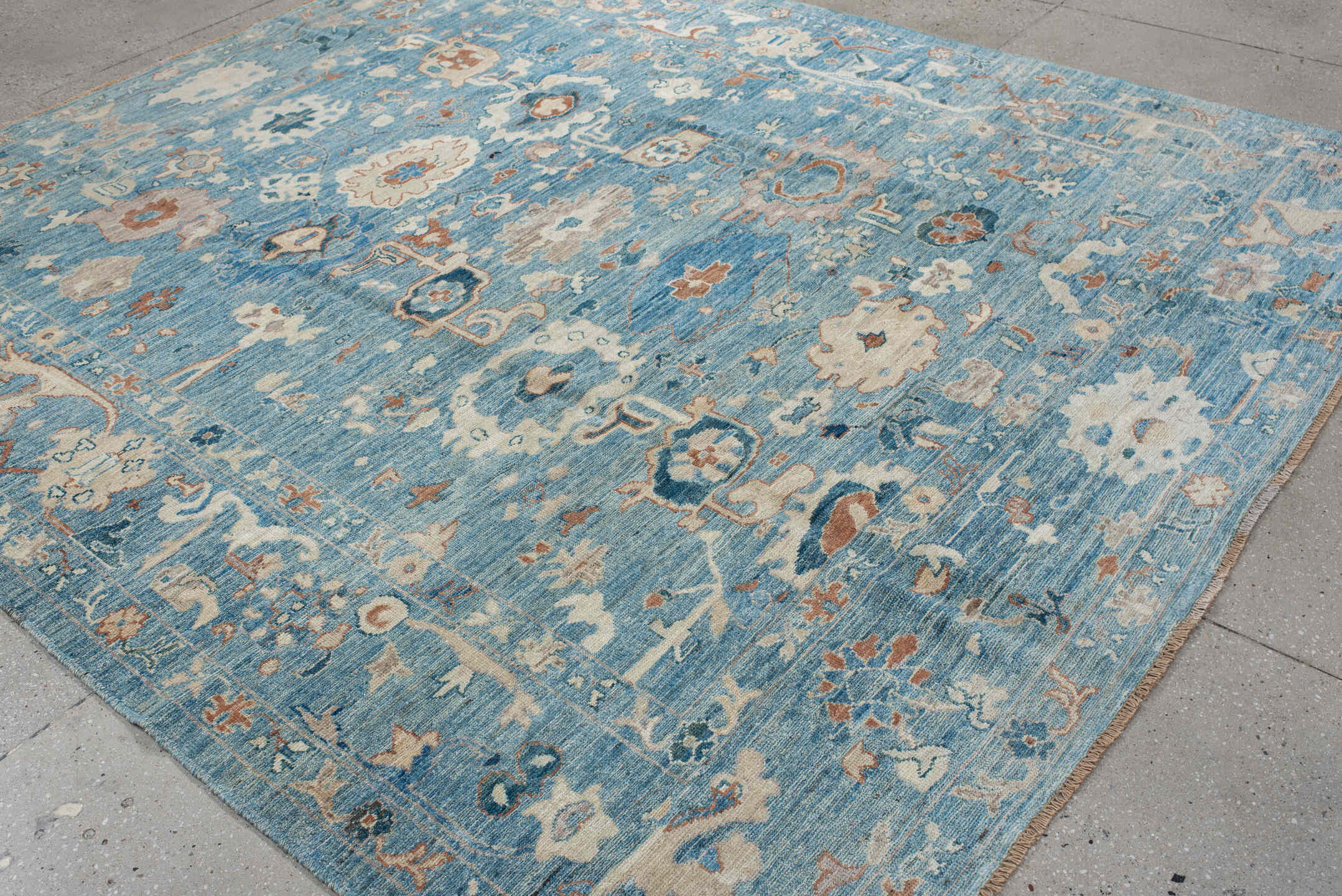 8' x 9' one-of-a-kind handmade vintage Oushak rug. Color palette: sky blue, ivory, peach, taupe, navy, slate, camel