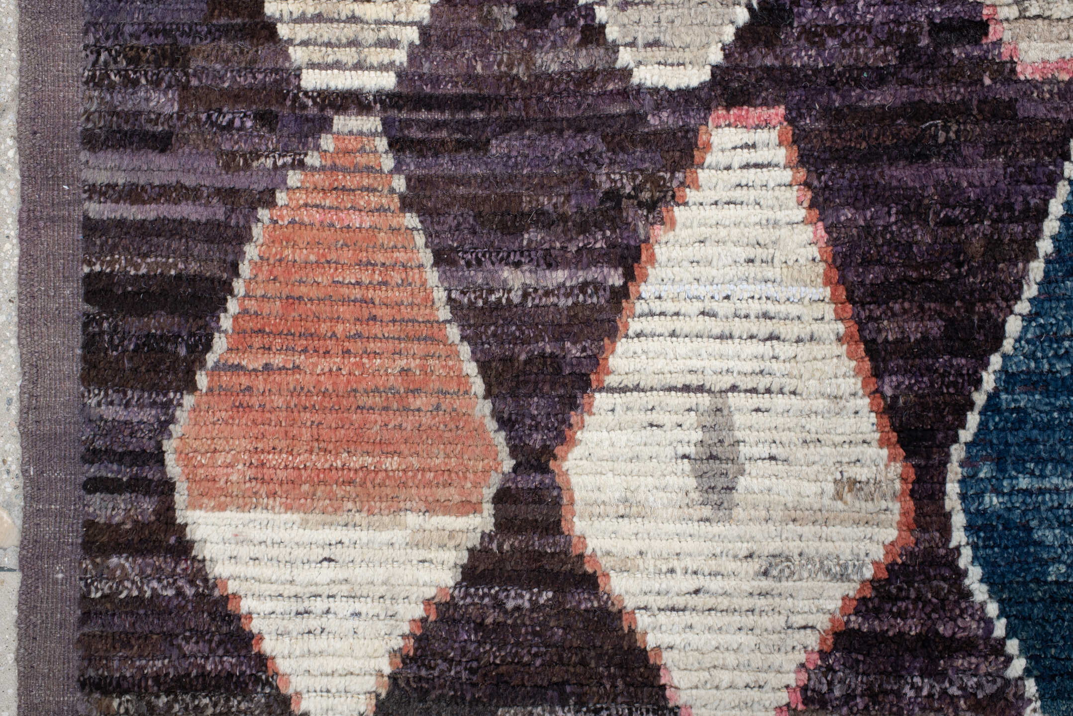 9' x 12' one-of-a-kind handmade vintage Tulu large size rug. Color palette: plum, ivory, taupe, indigo, coral, rose