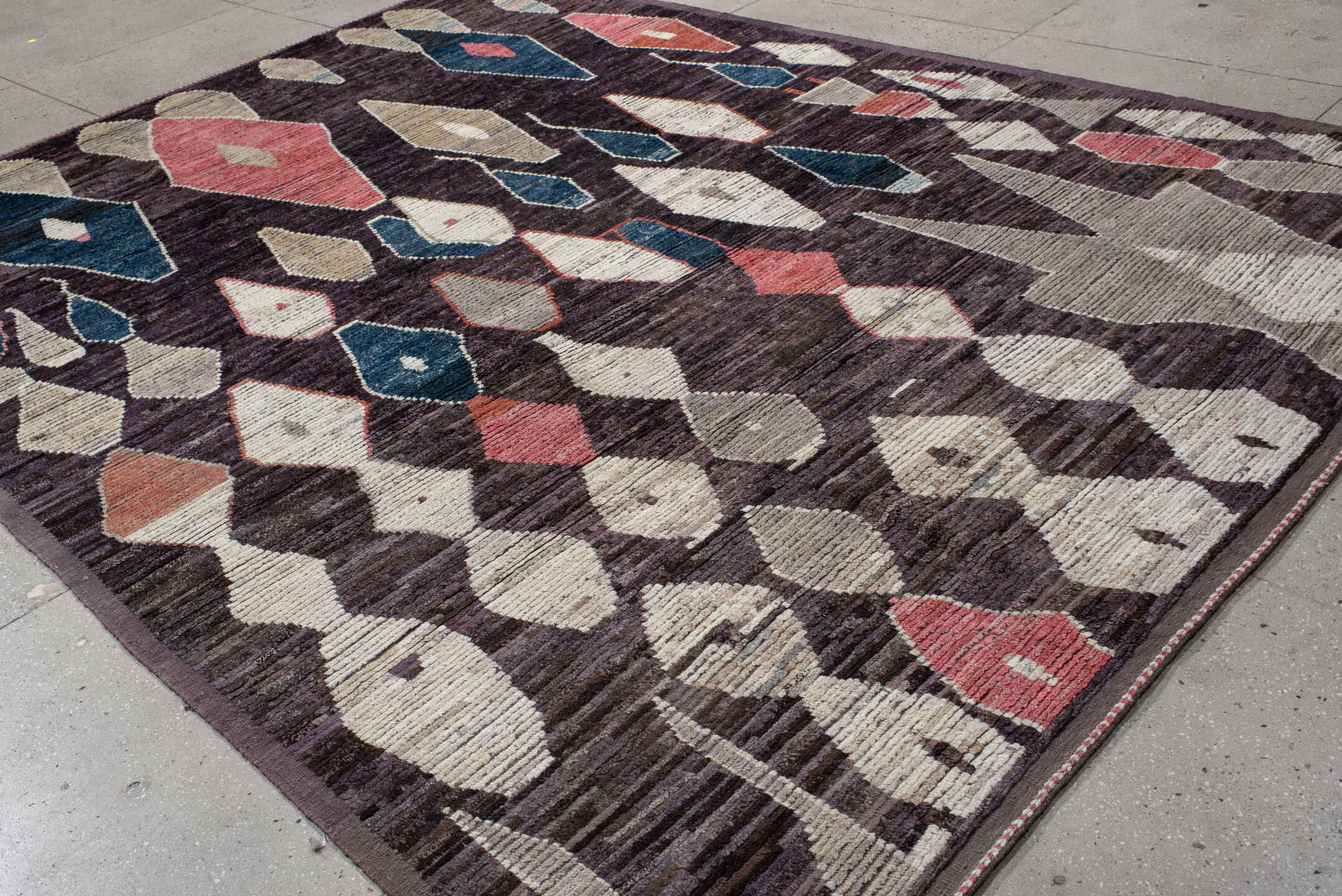 9' x 12' one-of-a-kind handmade vintage Tulu large size rug. Color palette: plum, ivory, taupe, indigo, coral, rose