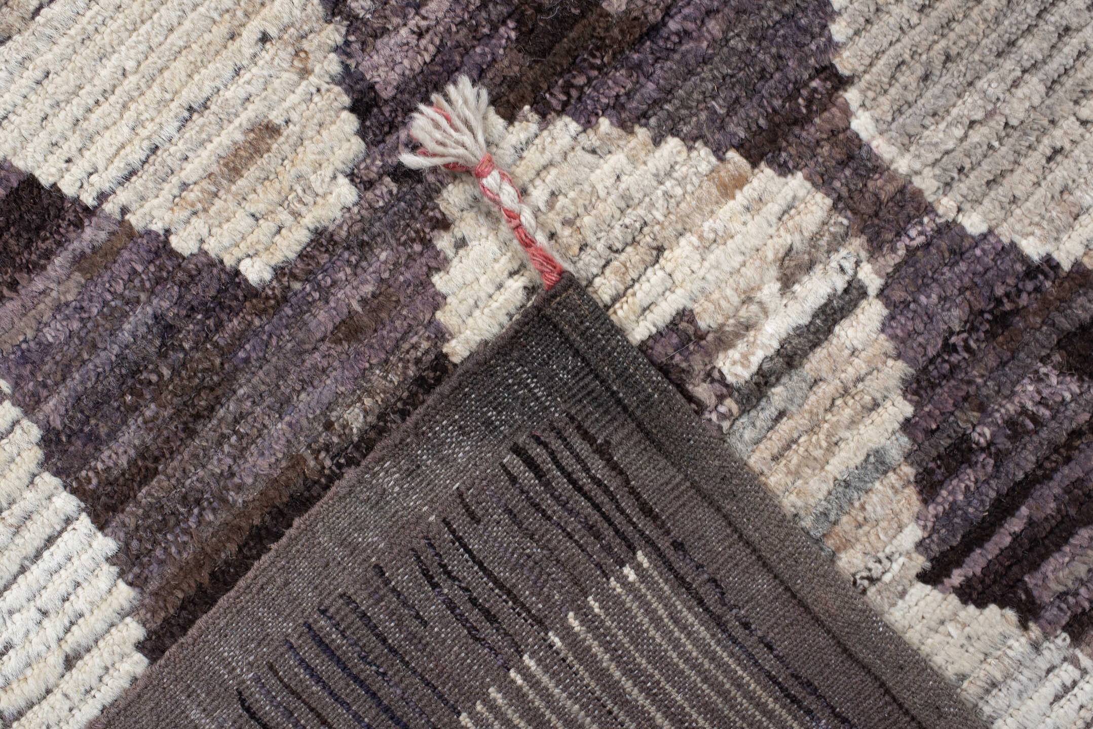 9' x 12' one-of-a-kind handmade vintage Tulu large size rug. Color palette: plum, ivory, taupe, indigo, coral, rose