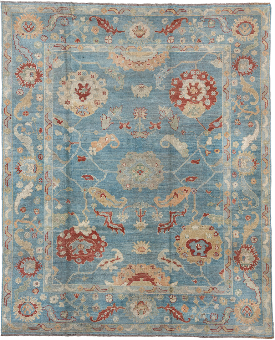 7' x 9' one-of-a-kind handmade vintage Oushak rug. Color palette: sky blue, ivory, rust, blush, beige, sage, light blue