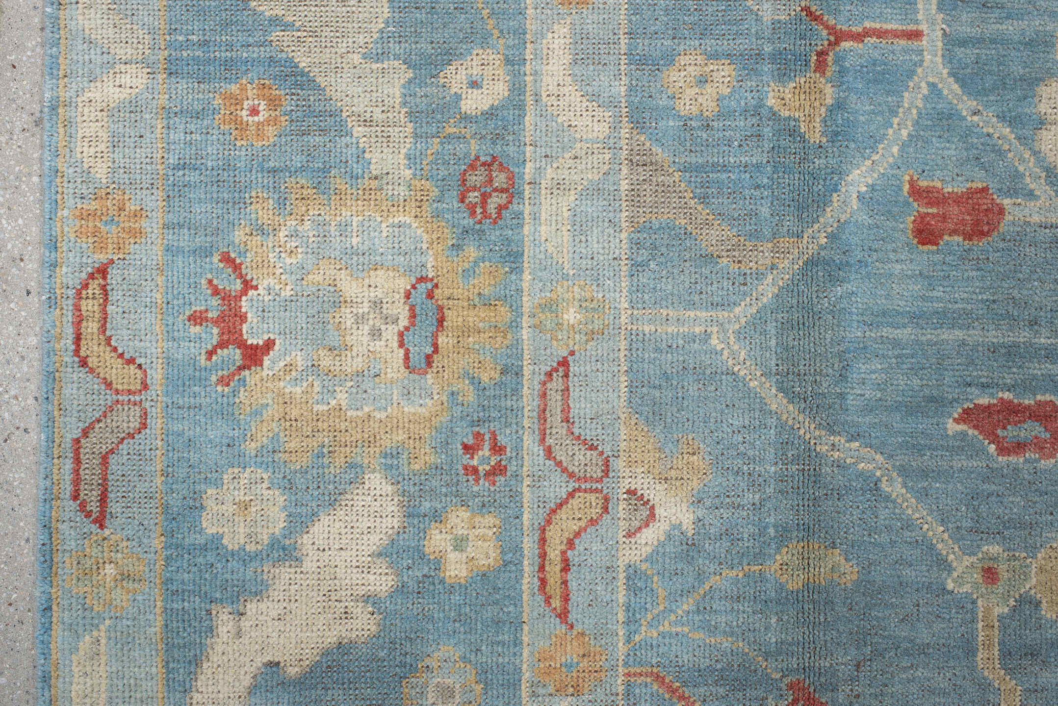 7' x 9' one-of-a-kind handmade vintage Oushak rug. Color palette: sky blue, ivory, rust, blush, beige, sage, light blue