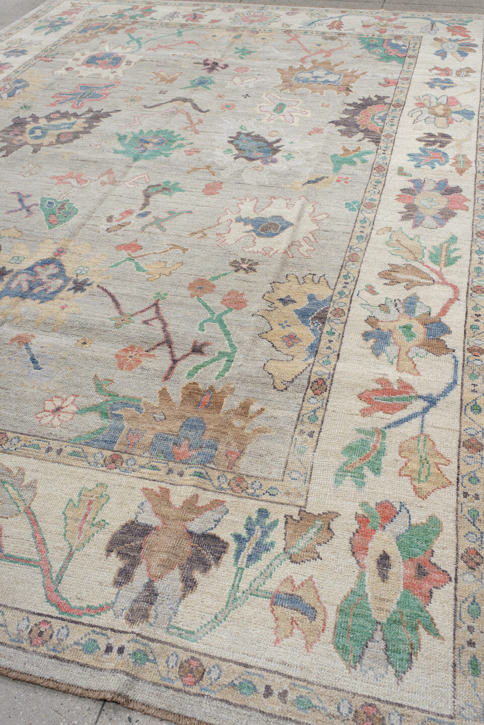 9' x 14' one-of-a-kind handmade vintage Oushak large size rug. Color palette: ivory, pale gray, aqua, coral, blue, sage