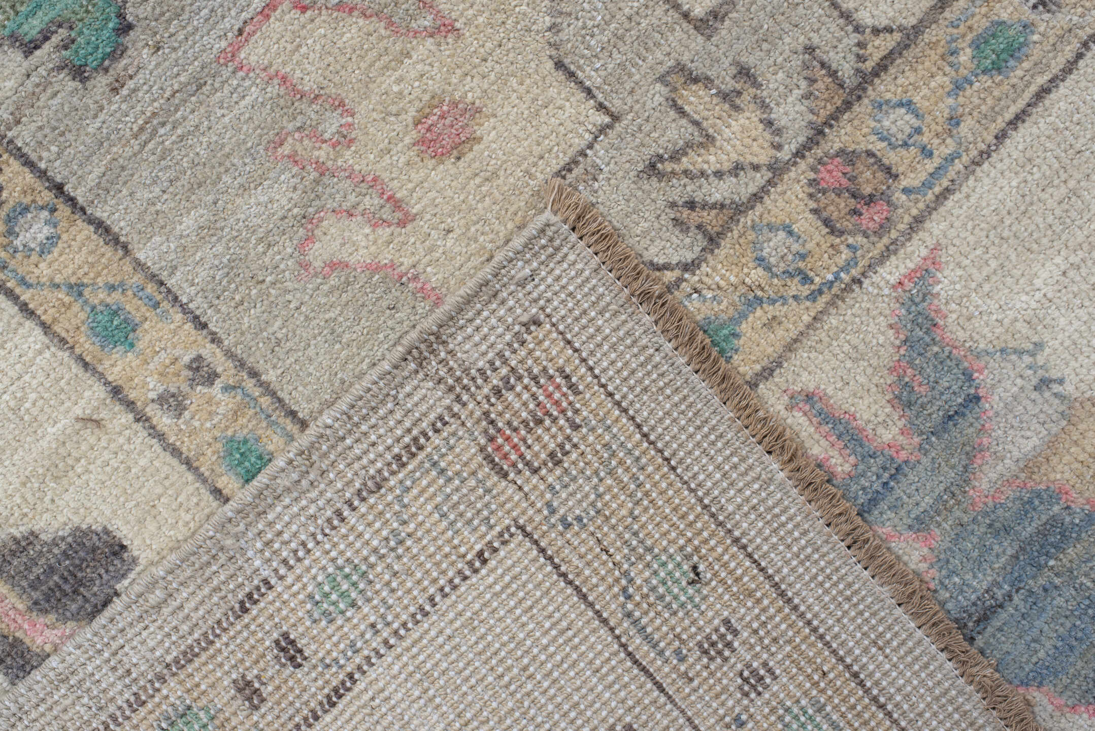 9' x 14' one-of-a-kind handmade vintage Oushak large size rug. Color palette: ivory, pale gray, aqua, coral, blue, sage
