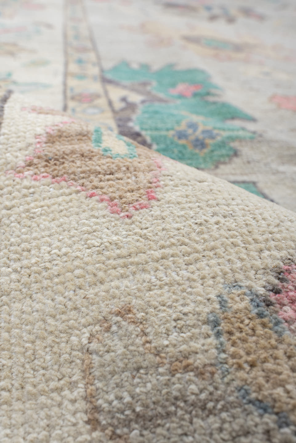 9' x 14' one-of-a-kind handmade vintage Oushak large size rug. Color palette: ivory, pale gray, aqua, coral, blue, sage