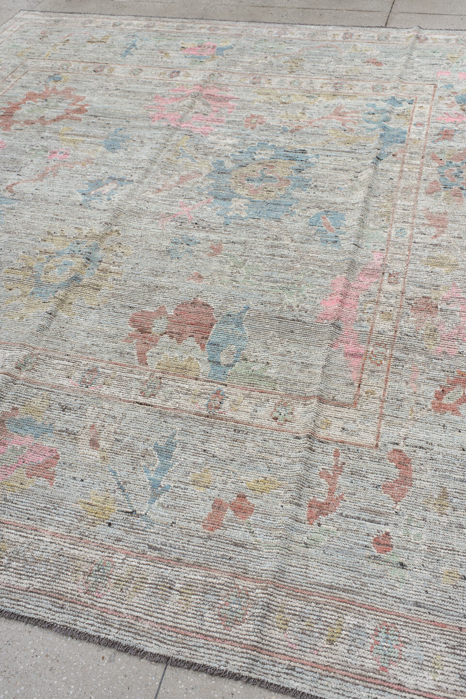 8' x 9' one-of-a-kind handmade vintage Oushak rug. Color palette: ivory, pale blue, blush, taupe, muted gold, terra cotta