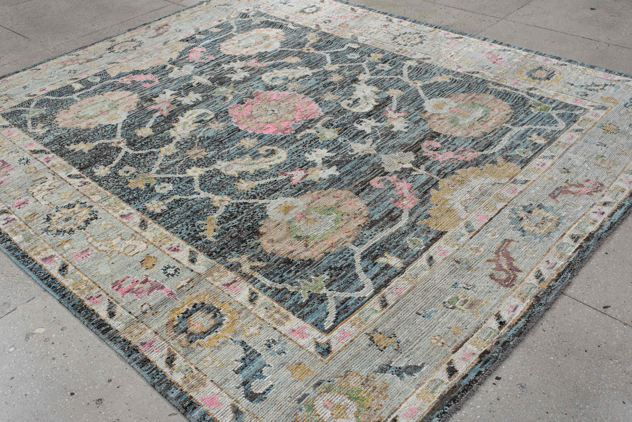 8' x 9' one-of-a-kind handmade vintage Oushak rug. Color palette: charcoal, ivory, beige, pink, aqua, gold, taupe, gray