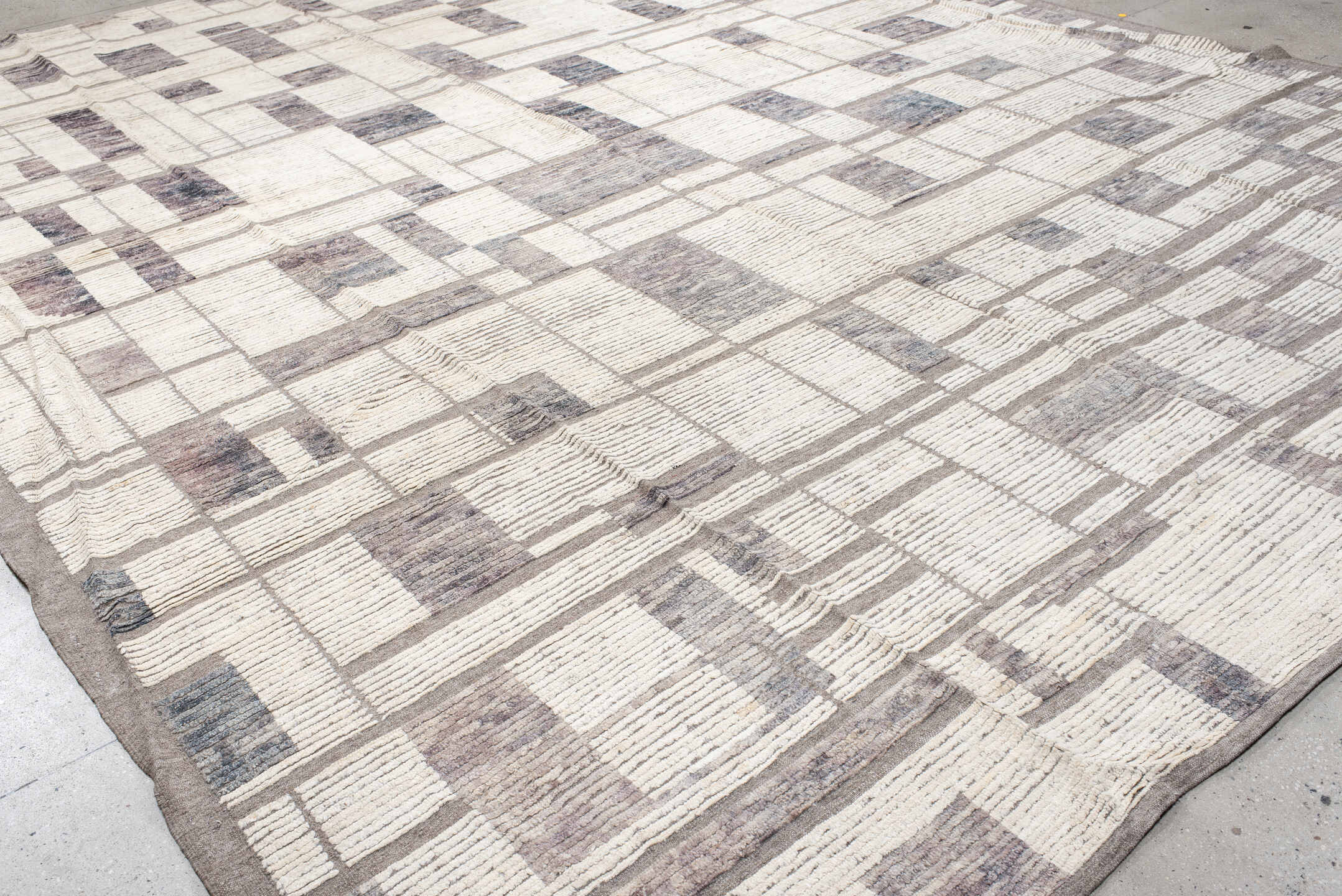 12' x 15' one-of-a-kind handmade vintage Tulu oversize rug. Color palette: ivory, taupe, gray, greige, charcoal, beige