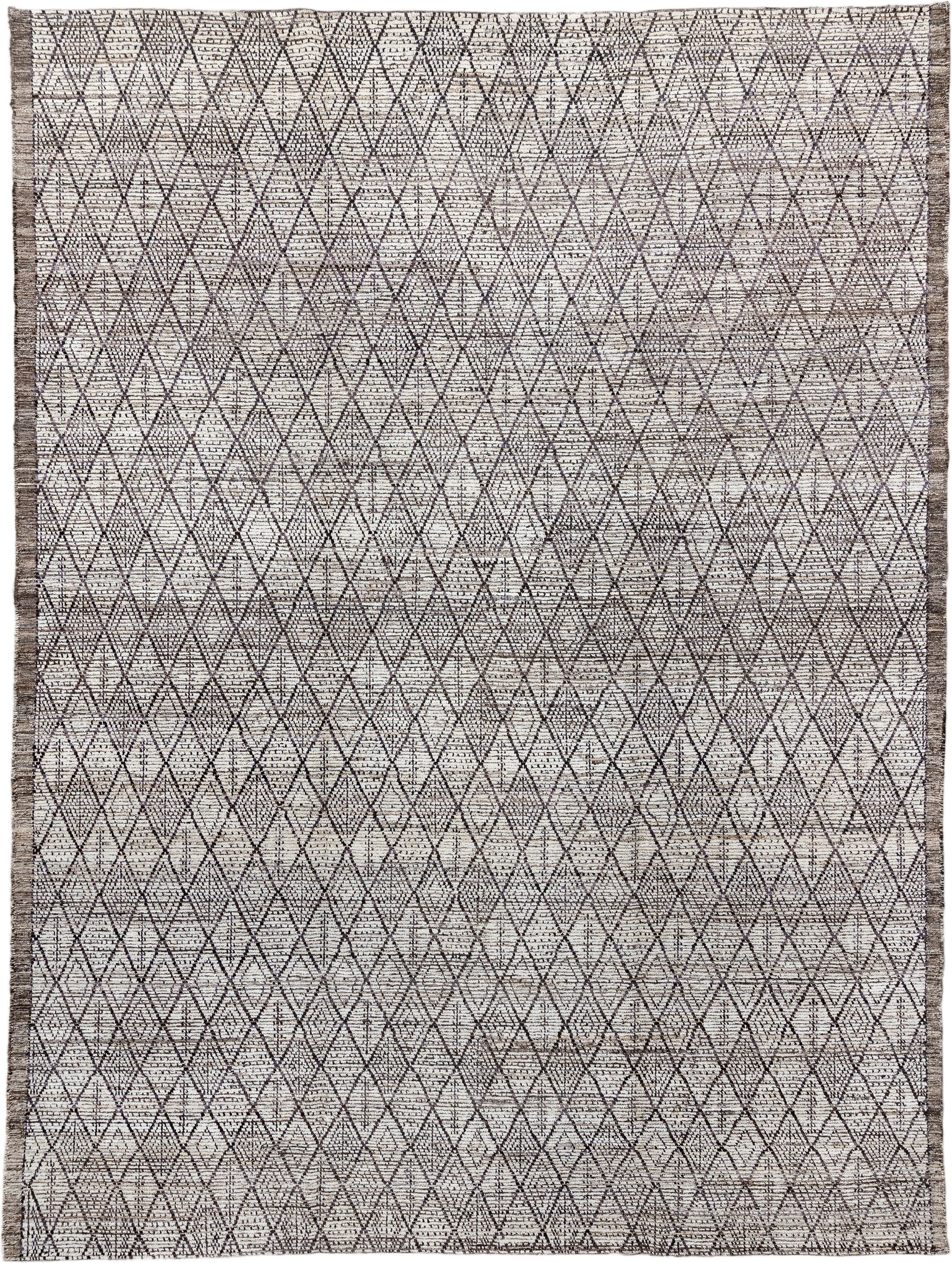 10' x 13' one-of-a-kind handmade vintage Tulu large size rug. Color palette: ivory, charcoal, taupe, brown, gray, black