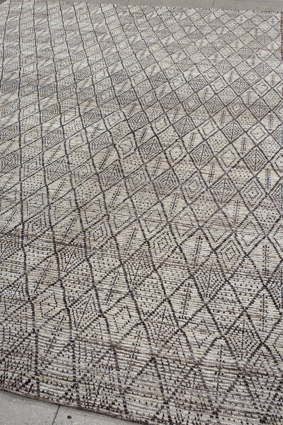 10' x 13' one-of-a-kind handmade vintage Tulu large size rug. Color palette: ivory, charcoal, taupe, brown, gray, black