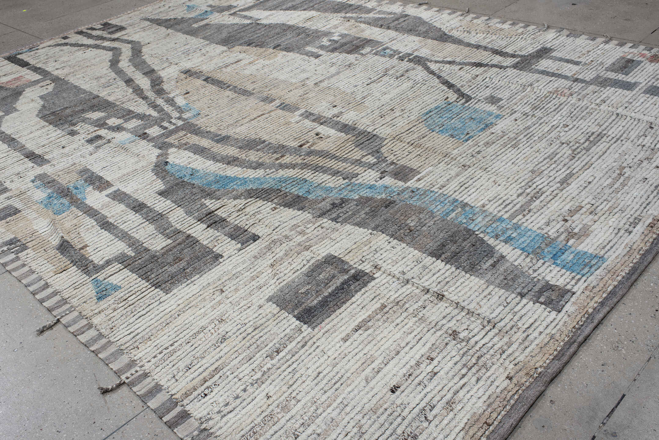10' x 13' one-of-a-kind handmade vintage Tulu large size rug. Color palette: ivory, charcoal, gray, sky_blue, taupe