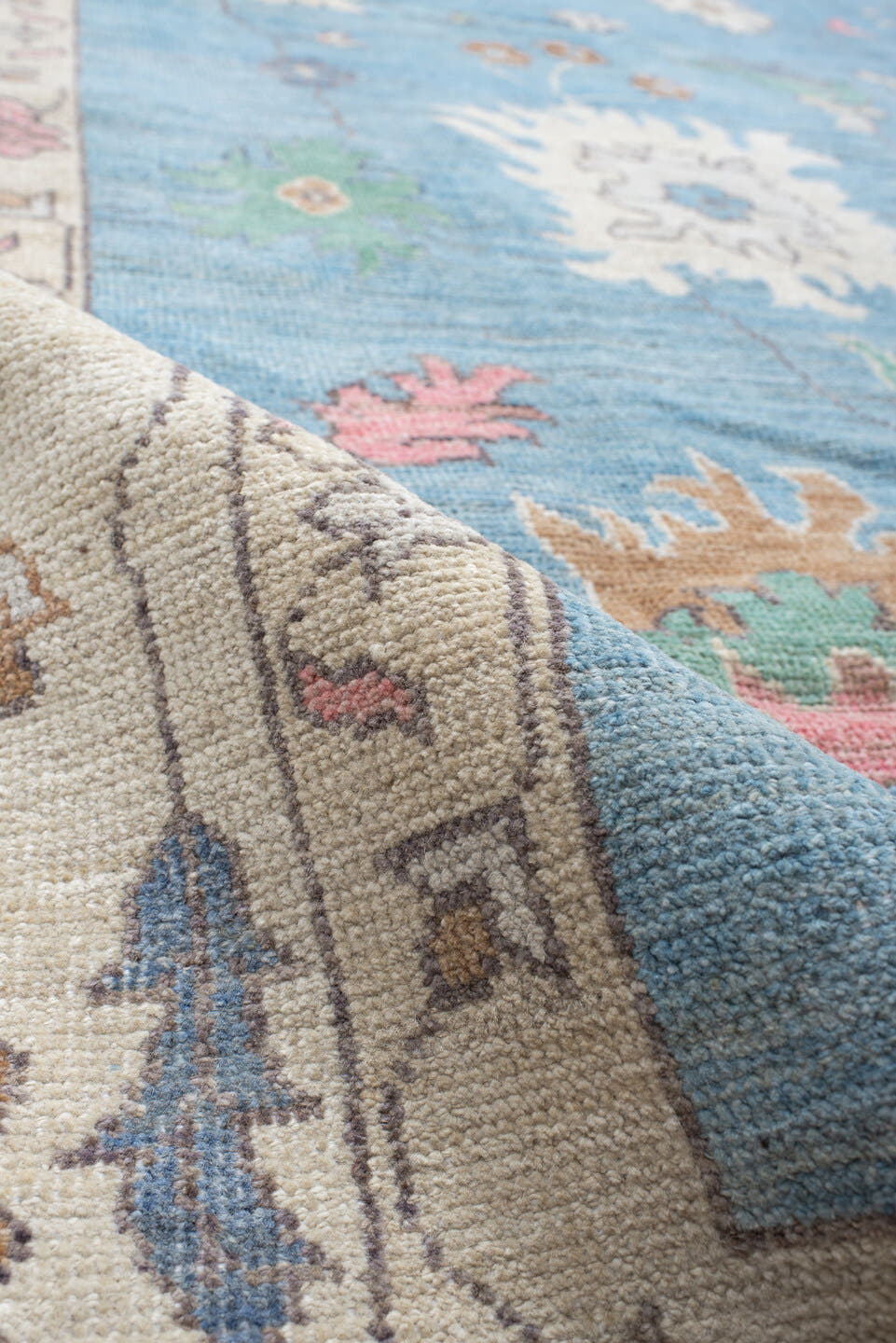 12' x 15' one-of-a-kind handmade vintage Oushak oversize rug. Color palette: sky blue, ivory, blush, sage, muted gold, taupe