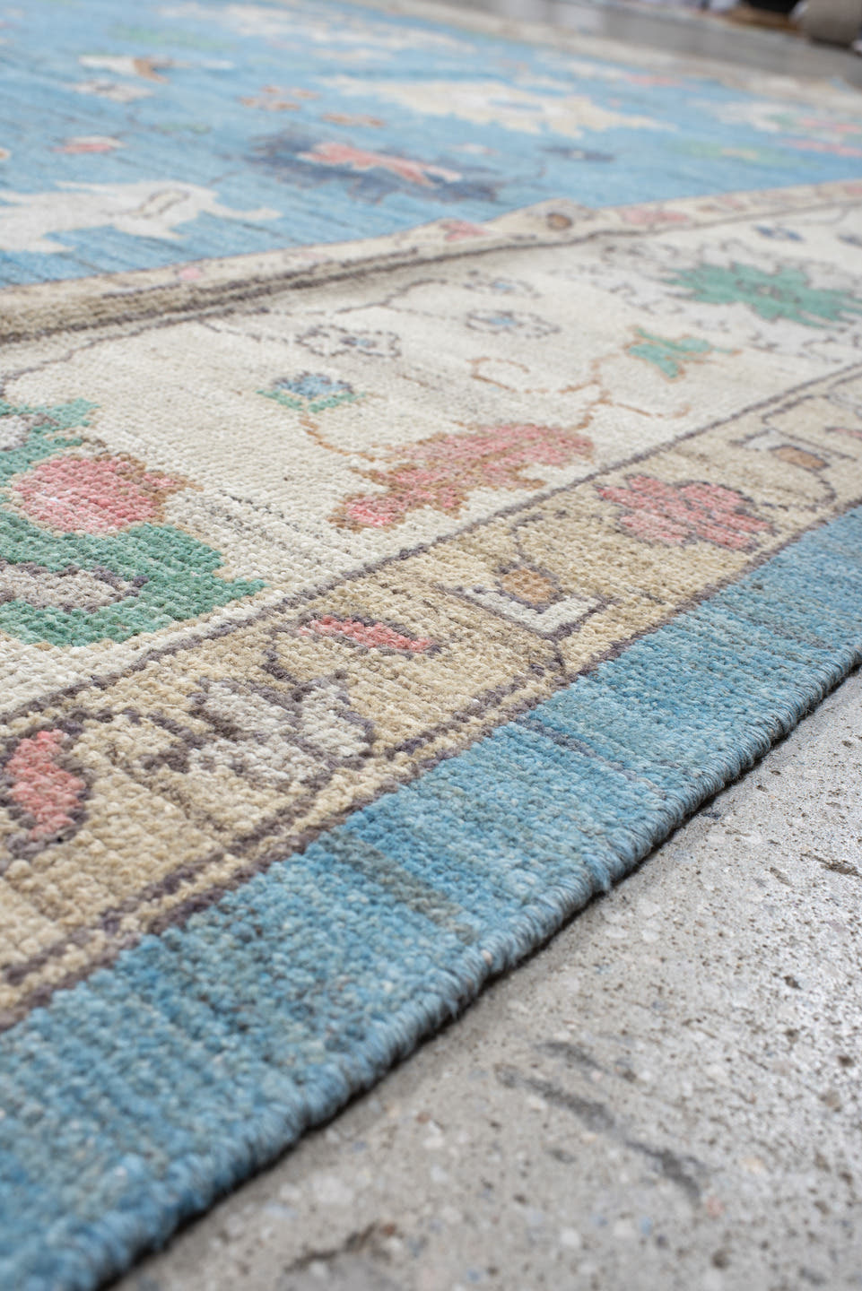 12' x 15' one-of-a-kind handmade vintage Oushak oversize rug. Color palette: sky blue, ivory, blush, sage, muted gold, taupe