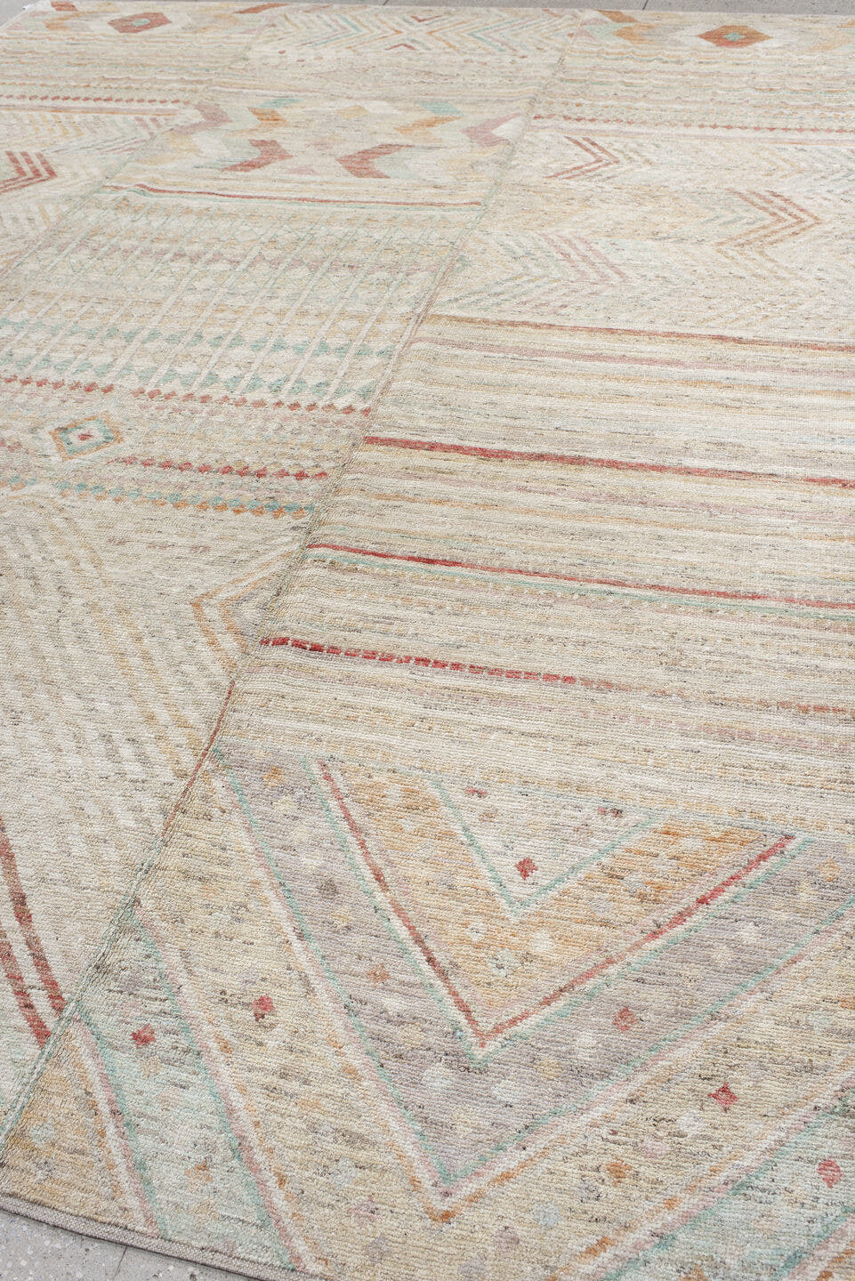 10' x 13' one-of-a-kind handmade vintage Tulu large size rug. Color palette: ivory, cream, blush, pale aqua, terra cotta