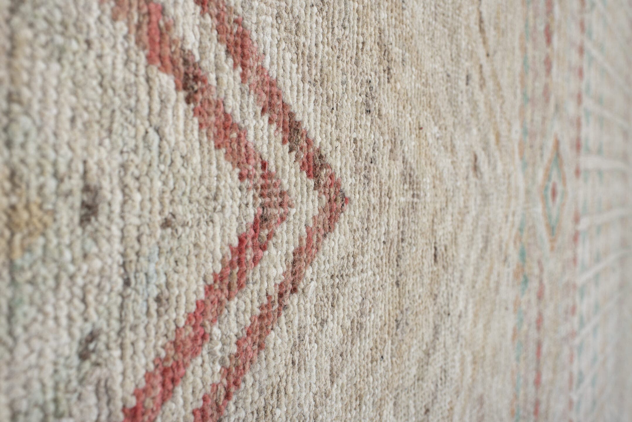 10' x 13' one-of-a-kind handmade vintage Tulu large size rug. Color palette: ivory, cream, blush, pale aqua, terra cotta