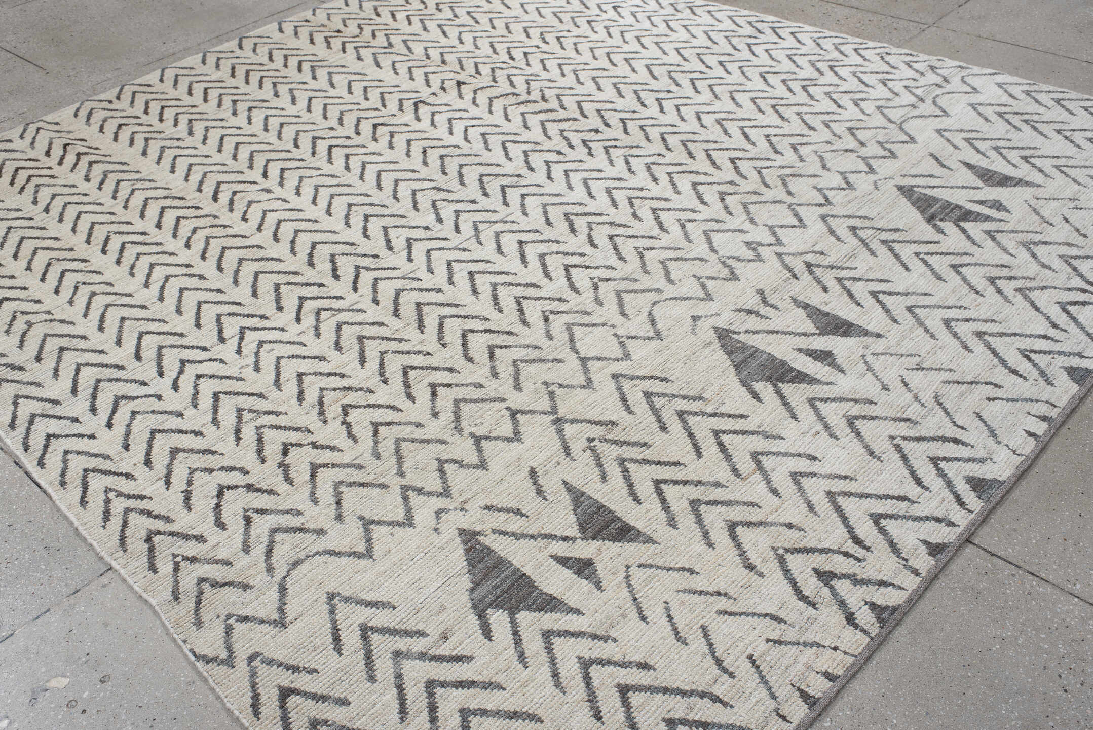 8' x 9' one-of-a-kind handmade vintage Tulu rug. Color palette: ivory, charcoal, taupe, gray, black, beige