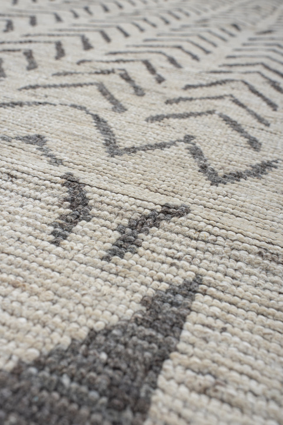 8' x 9' one-of-a-kind handmade vintage Tulu rug. Color palette: ivory, charcoal, taupe, gray, black, beige