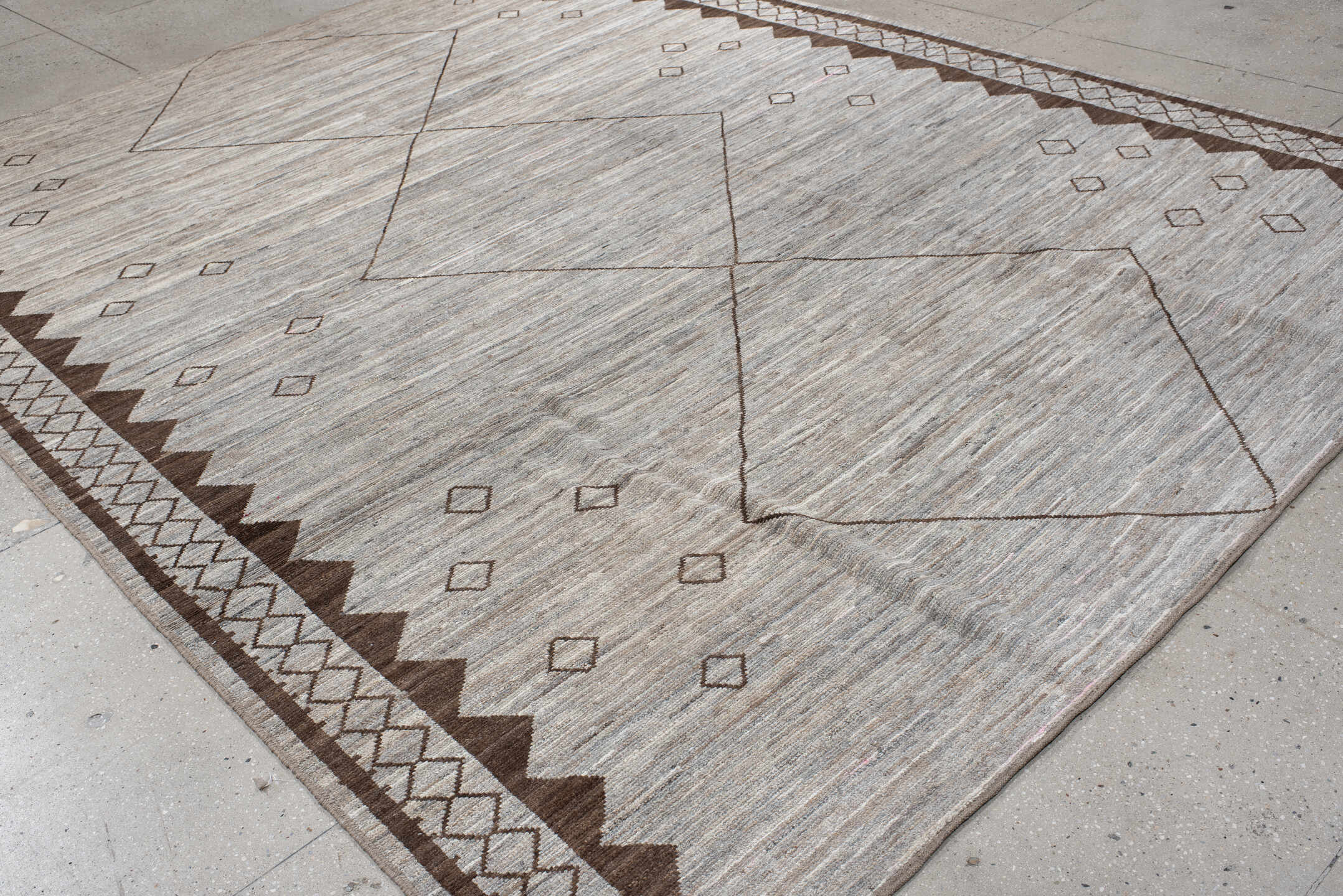 9' x 12' one-of-a-kind handmade vintage Tulu large size rug. Color palette: ivory, taupe, brown, camel, greige, beige, gray