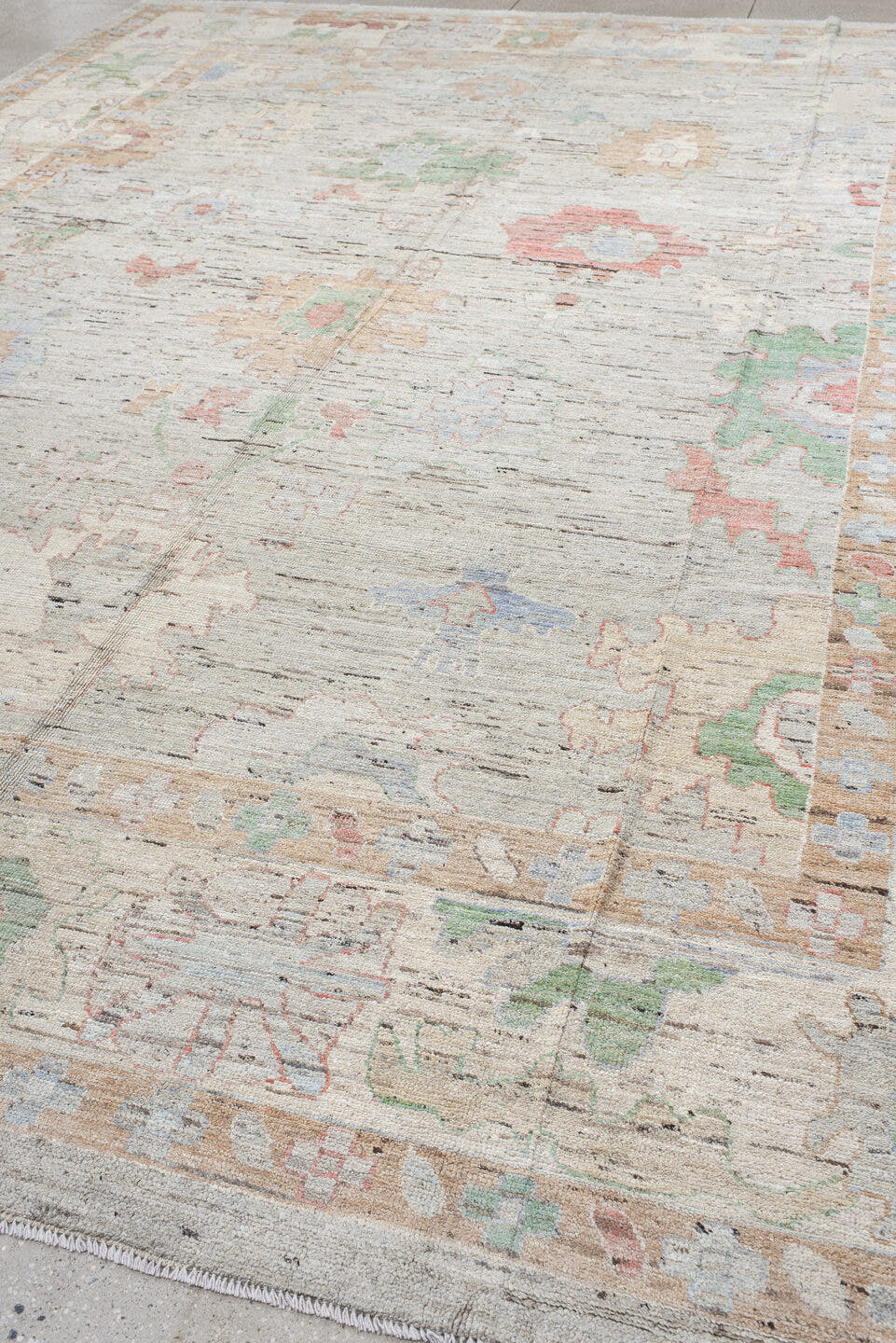 12' x 15' one-of-a-kind handmade vintage Oushak oversize rug. Color palette: light gray, ivory, blush, sage, muted blue
