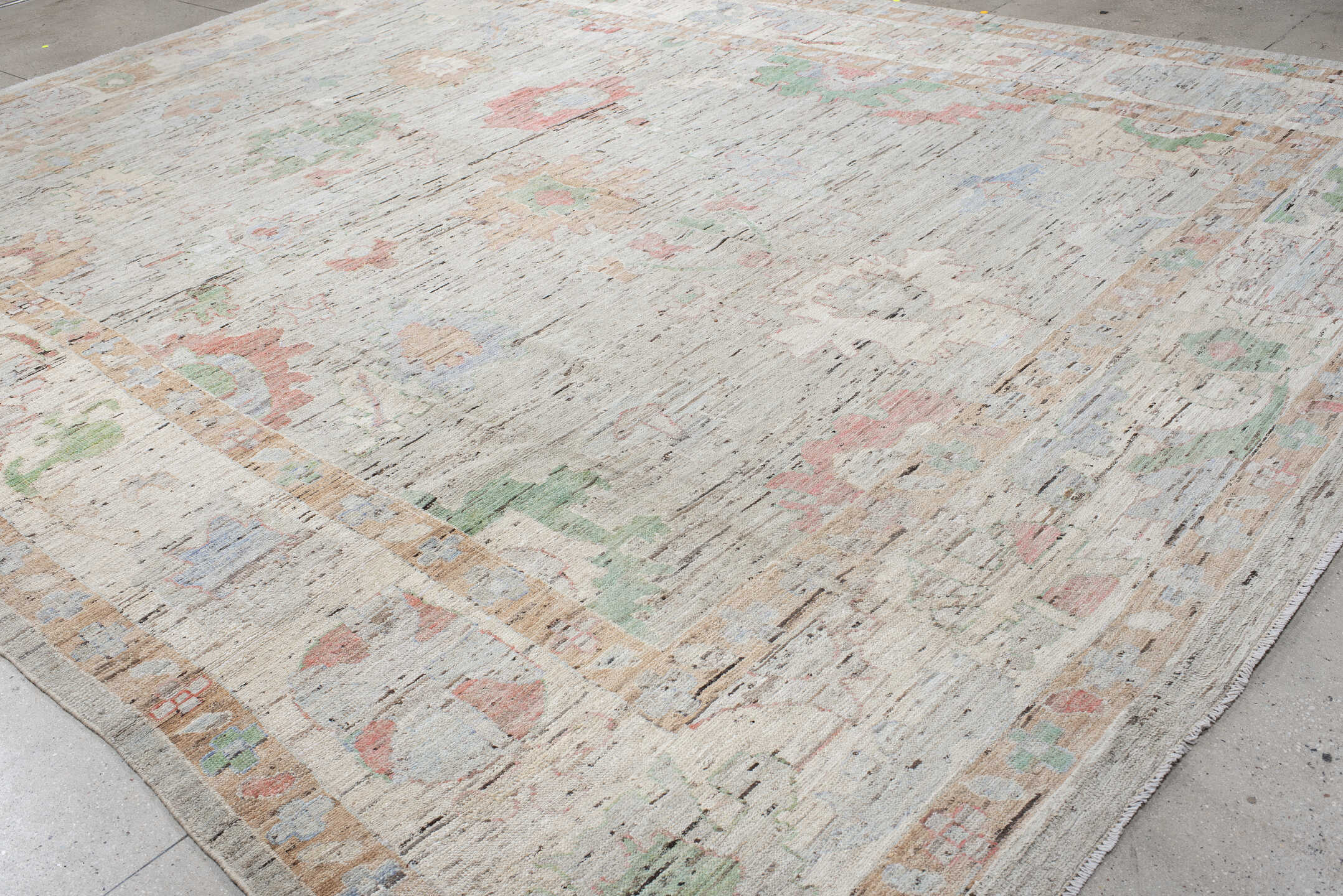 12' x 15' one-of-a-kind handmade vintage Oushak oversize rug. Color palette: light gray, ivory, blush, sage, muted blue
