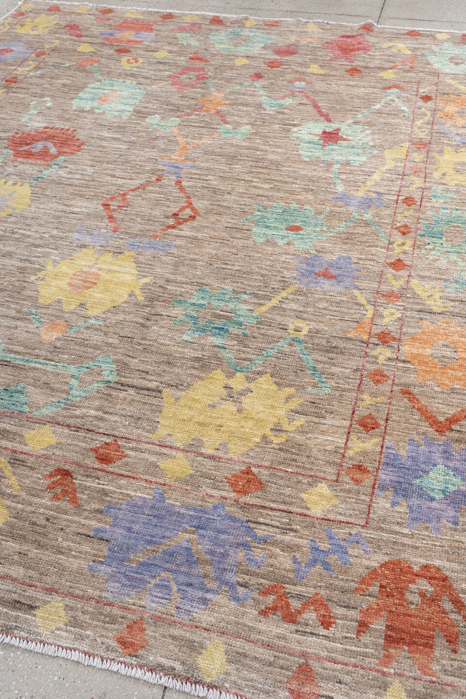 8' x 9' one-of-a-kind handmade vintage Oushak rug. Color palette: taupe, aqua, rust, pale yellow, peach, lavender, ivory
