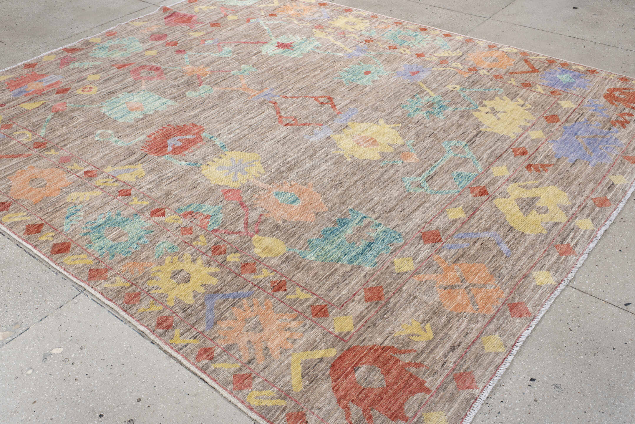 8' x 9' one-of-a-kind handmade vintage Oushak rug. Color palette: taupe, aqua, rust, pale yellow, peach, lavender, ivory