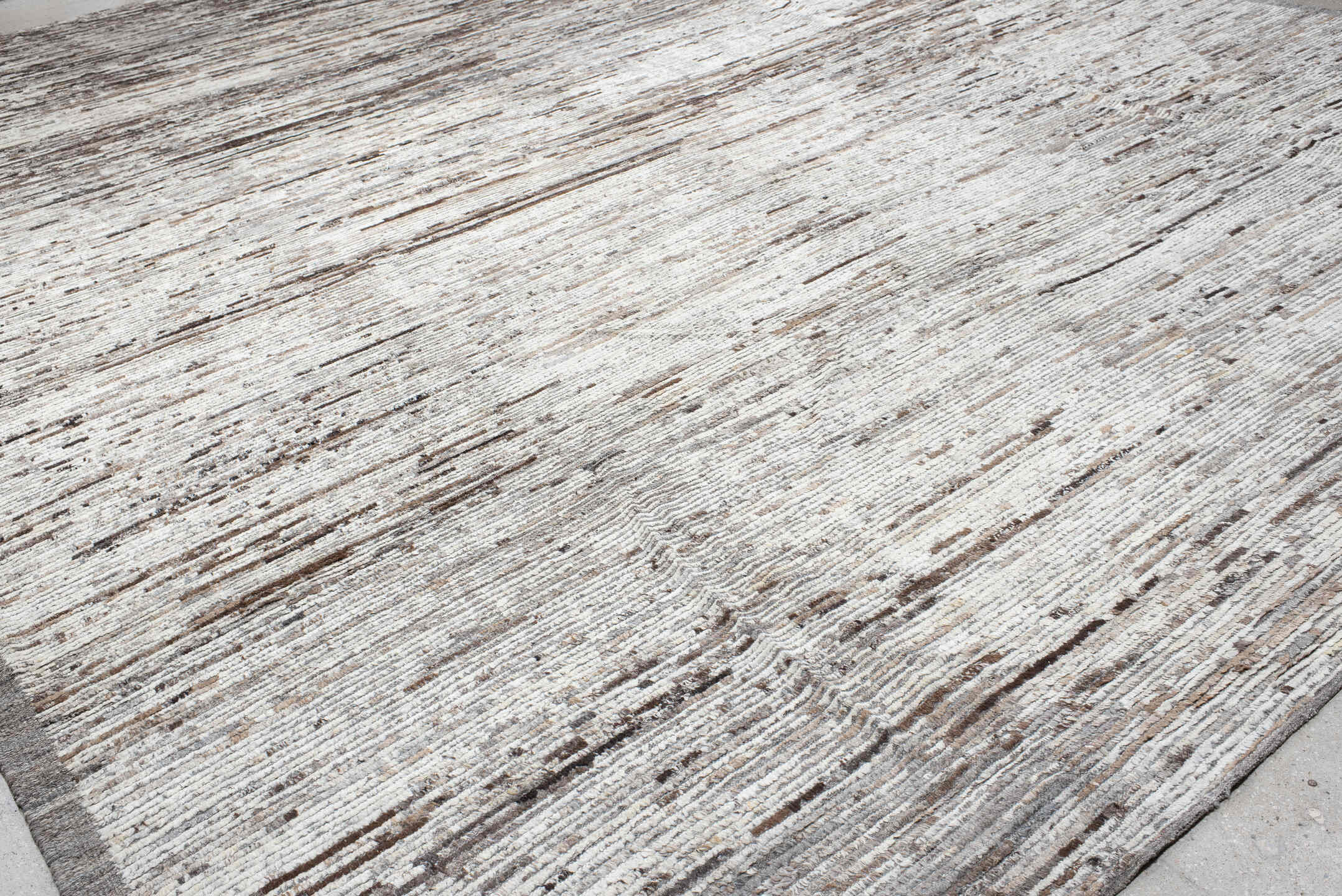 14' x 19' one-of-a-kind handmade vintage Tulu oversize rug. Color palette: ivory, taupe, brown, beige, gray