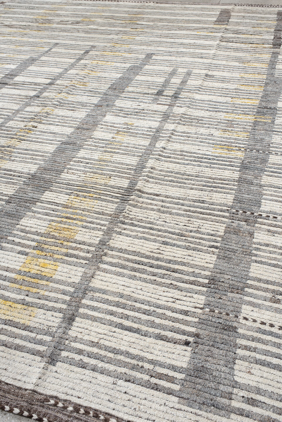 12' x 15' one-of-a-kind handmade vintage Tulu oversize rug. Color palette: ivory, gray, charcoal, gold, taupe, black, beige