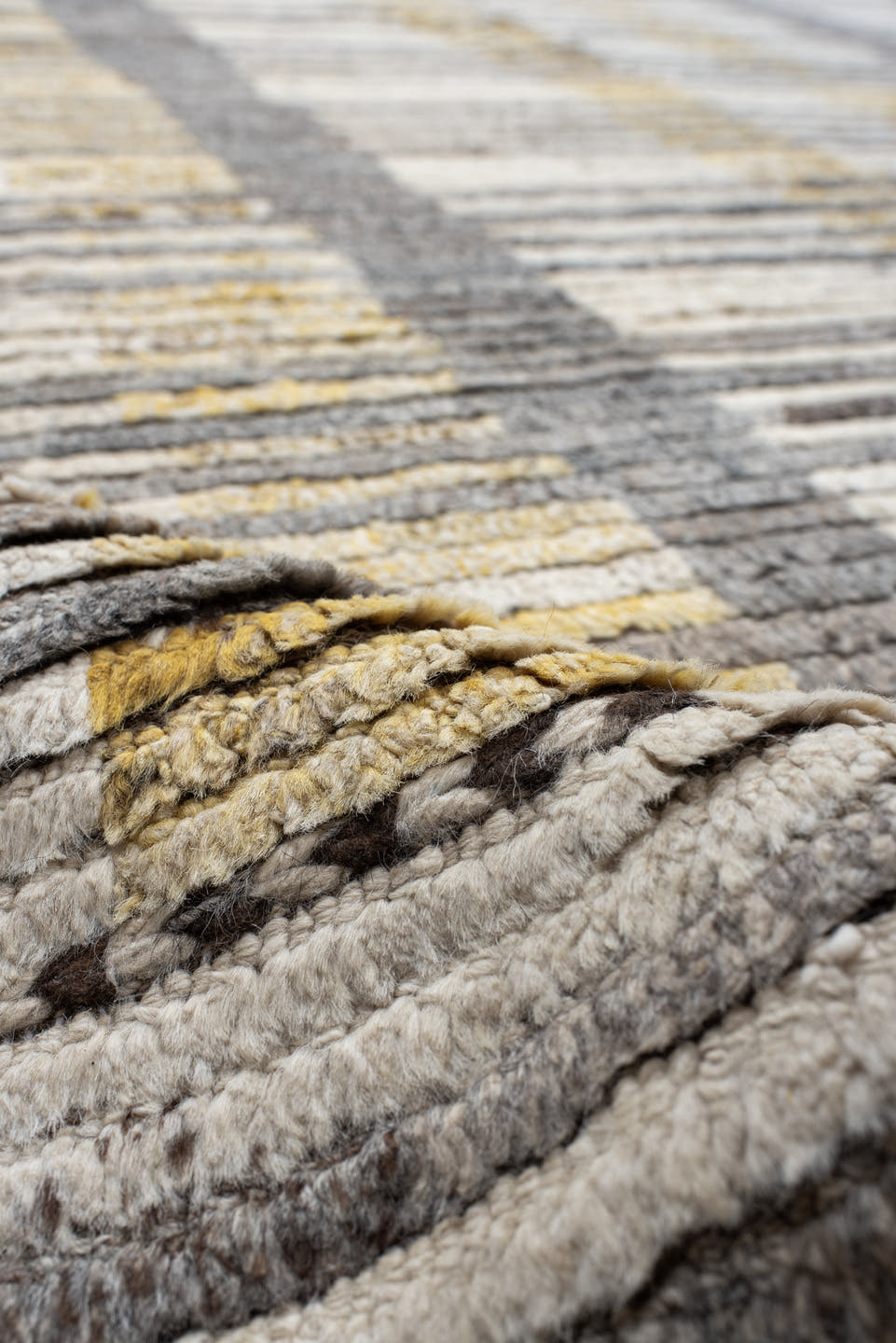 12' x 15' one-of-a-kind handmade vintage Tulu oversize rug. Color palette: ivory, gray, charcoal, gold, taupe, black, beige