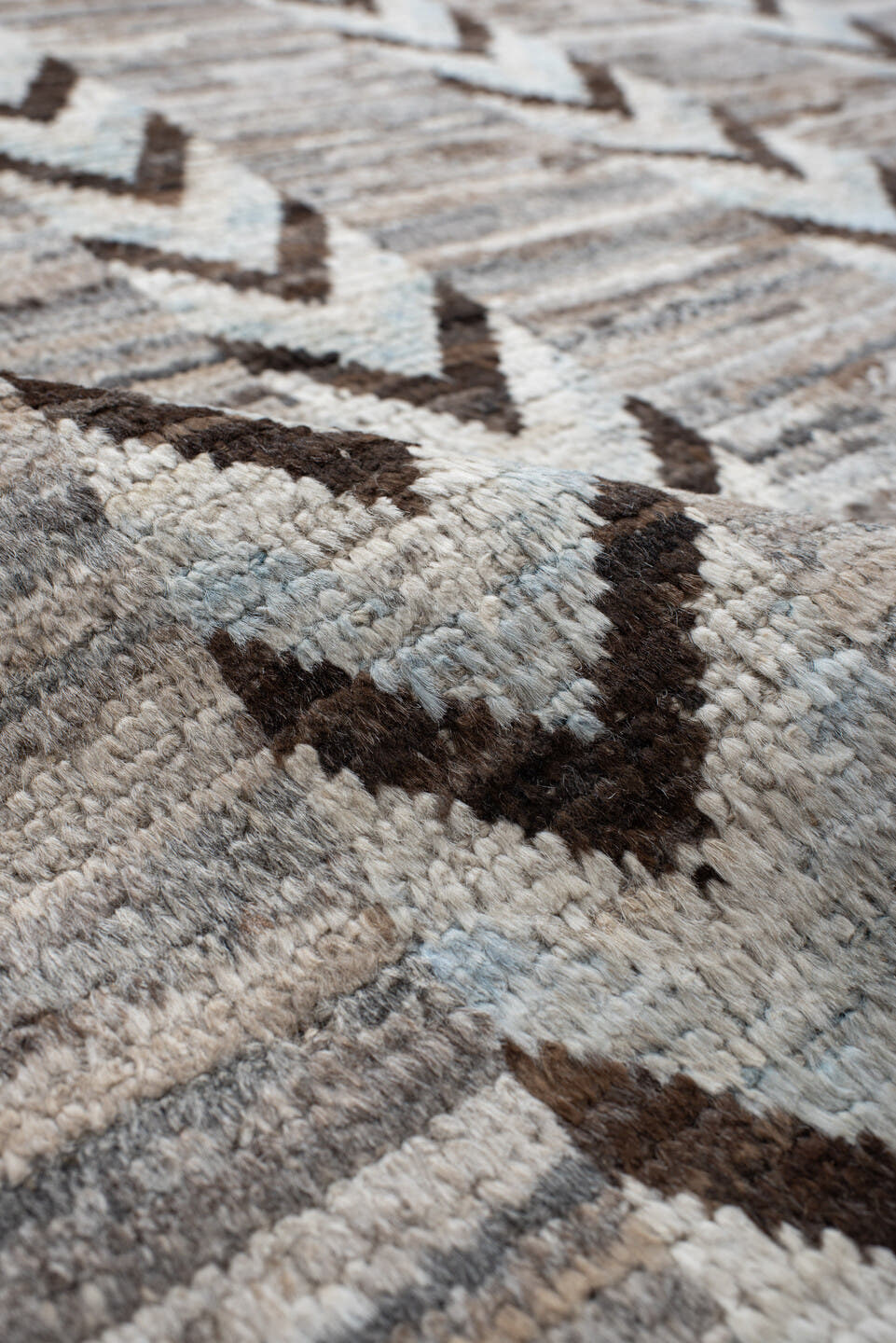 12' x 15' one-of-a-kind handmade vintage Tulu oversize rug. Color palette: ivory, taupe, brown, gray, charcoal, beige, black
