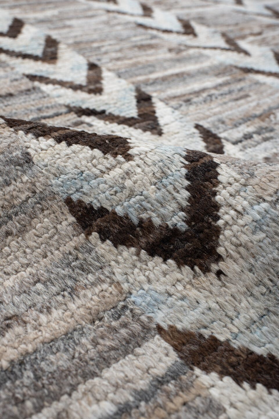 12' x 15' one-of-a-kind handmade vintage Tulu oversize rug. Color palette: ivory, taupe, brown, gray, charcoal, beige, black