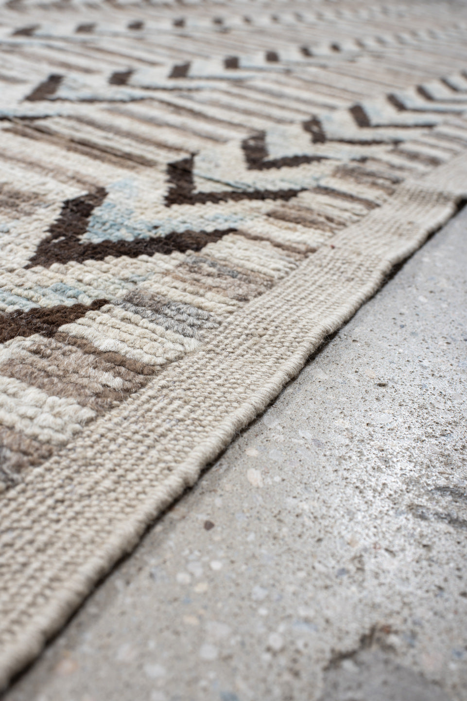 12' x 15' one-of-a-kind handmade vintage Tulu oversize rug. Color palette: ivory, taupe, brown, gray, charcoal, beige, black