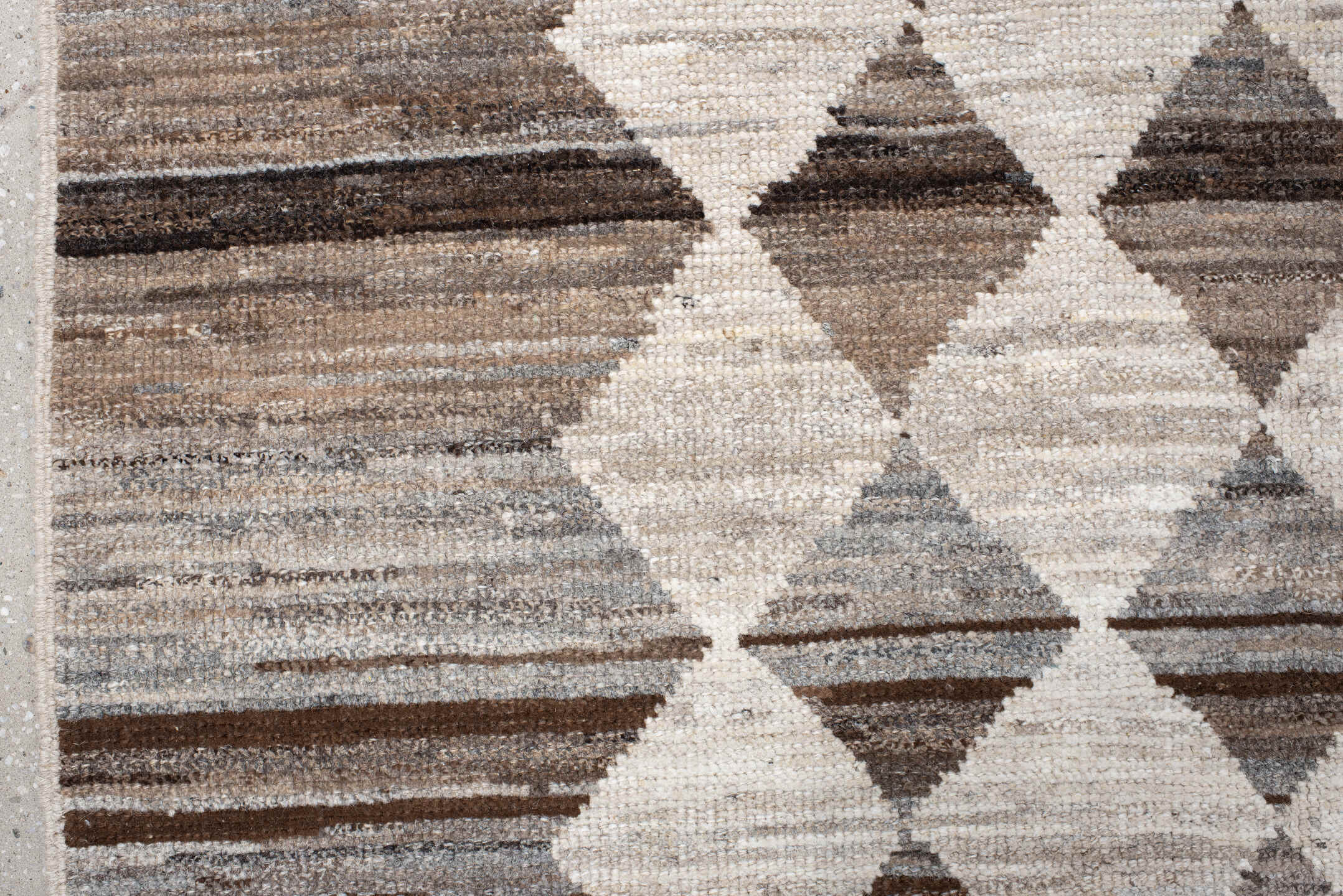 12' x 15' one-of-a-kind handmade vintage Tulu oversize rug. Color palette: ivory, taupe, brown, gray, charcoal, beige, black