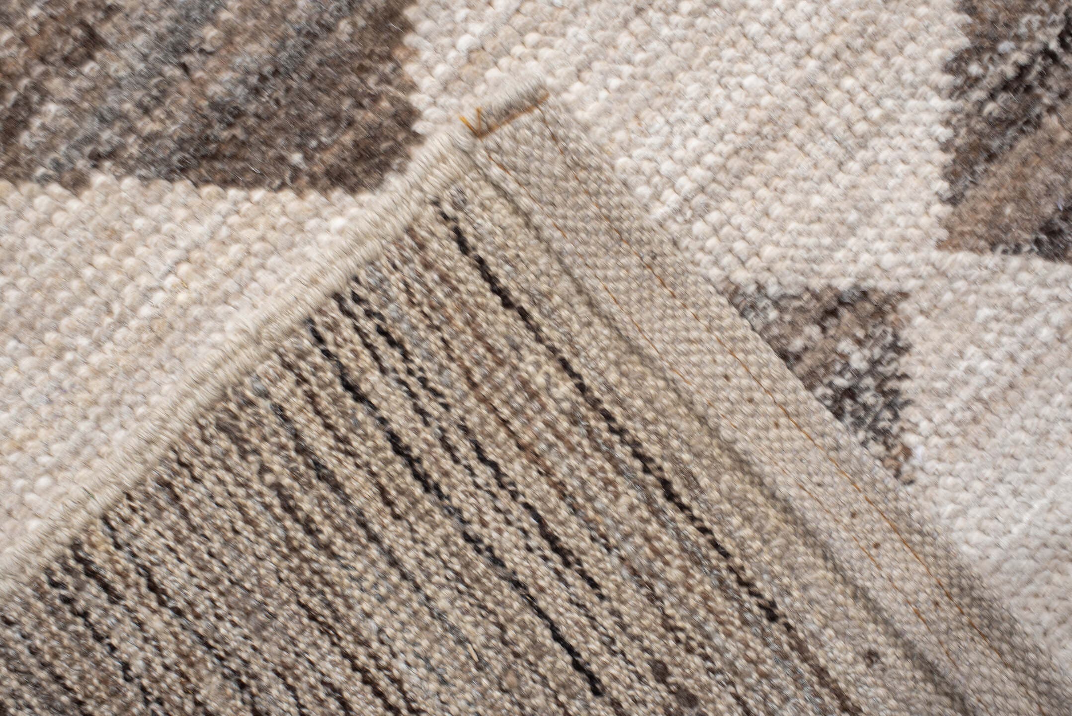 12' x 15' one-of-a-kind handmade vintage Tulu oversize rug. Color palette: ivory, taupe, brown, gray, charcoal, beige, black