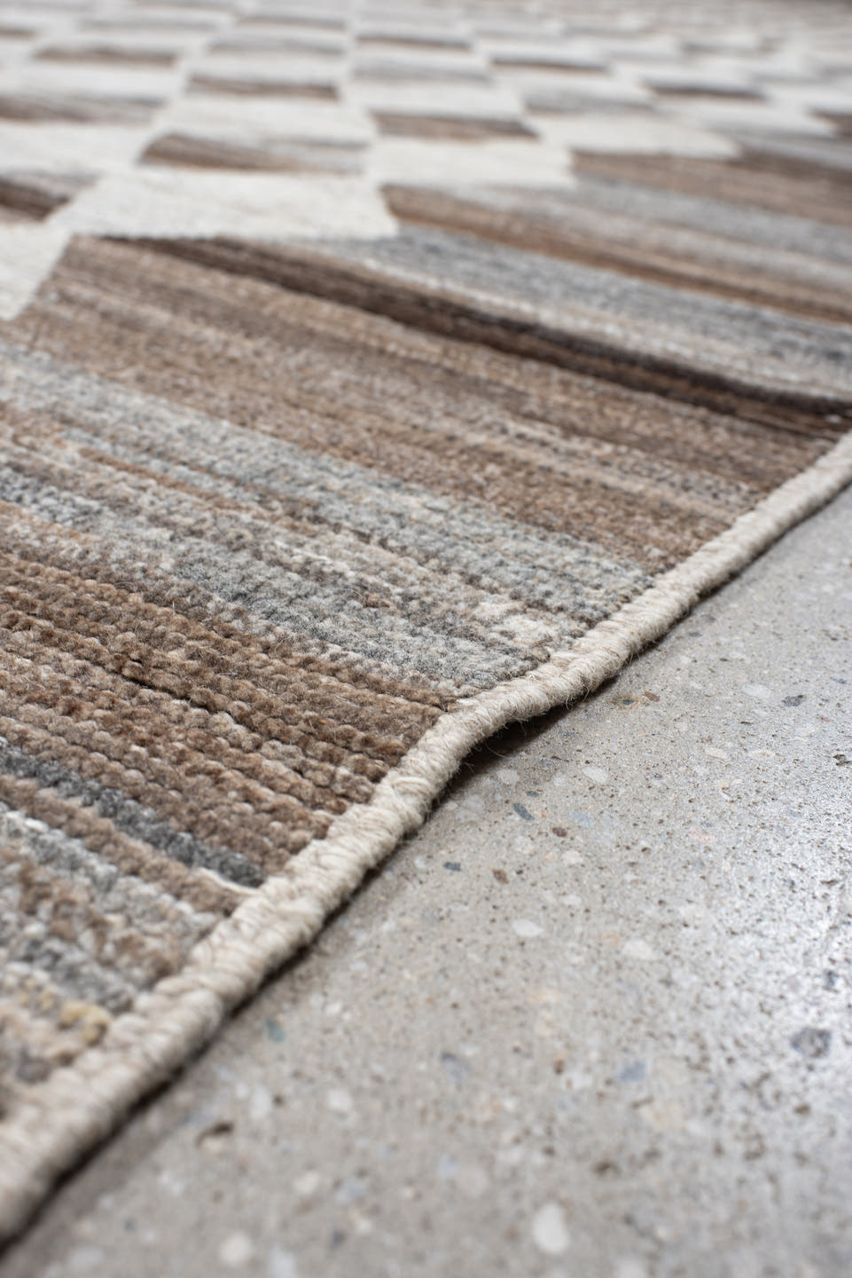 12' x 15' one-of-a-kind handmade vintage Tulu oversize rug. Color palette: ivory, taupe, brown, gray, charcoal, beige, black