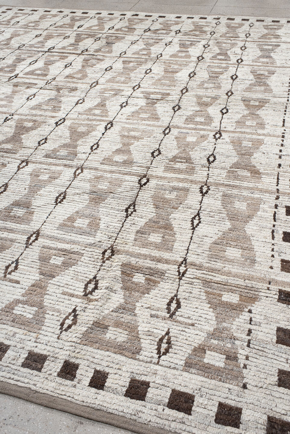 12' x 14' one-of-a-kind handmade vintage Tulu oversize rug. Color palette: ivory, taupe, brown, charcoal, beige, gray, black
