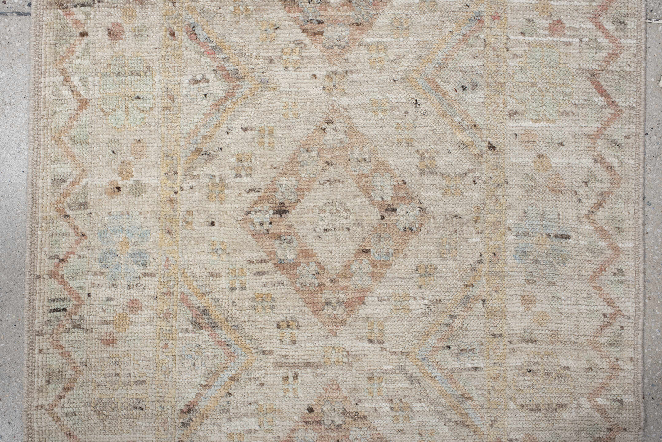 2' x 10' one-of-a-kind handmade vintage Tulu runner rug. Color palette: ivory, blush, pale blue, beige, taupe, sage, camel