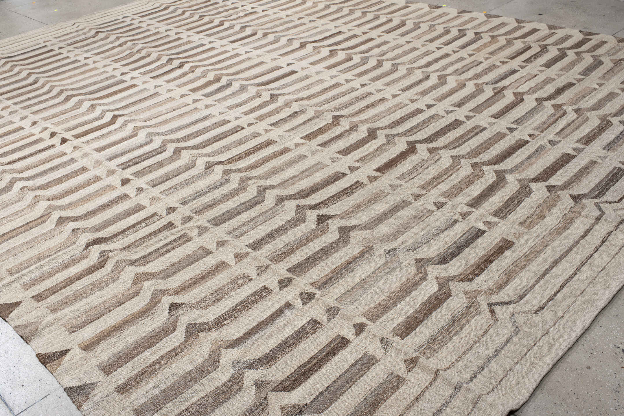 12' x 16' one-of-a-kind handmade vintage Kilim oversize rug. Color palette: gray, light gray, off-white, pink, linen