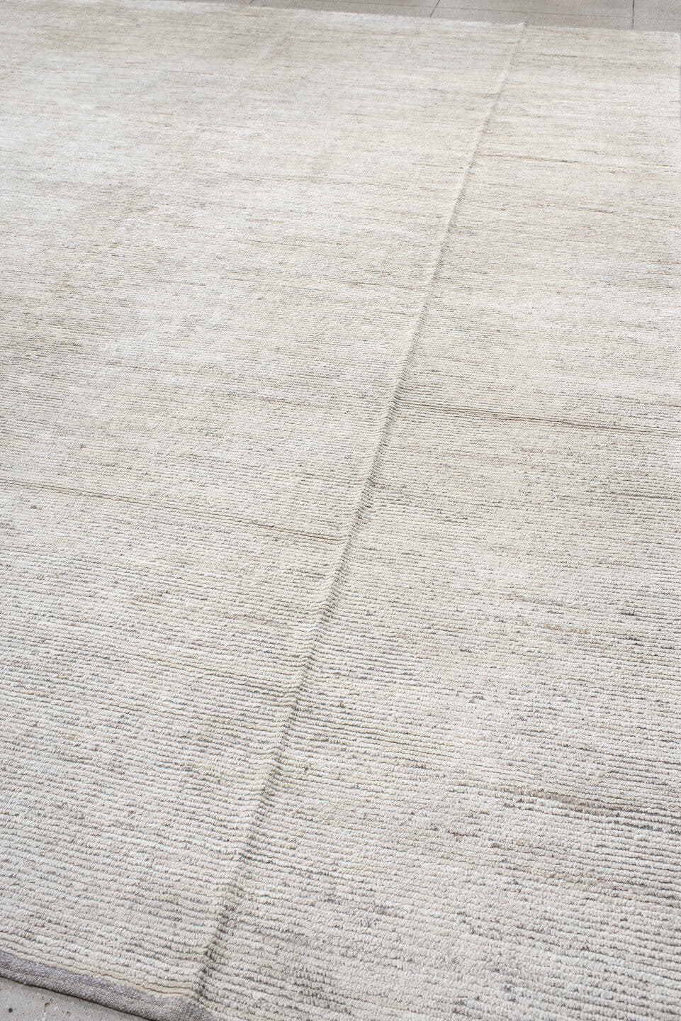 12' x 15' one-of-a-kind handmade vintage Tulu oversize rug. Color palette: ivory, cream, taupe, beige, gray