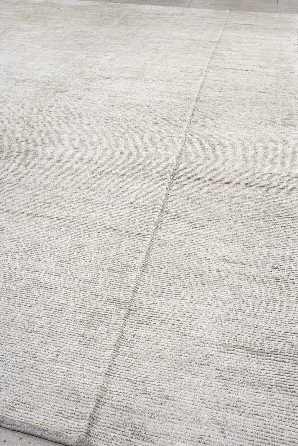12' x 15' one-of-a-kind handmade vintage Tulu oversize rug. Color palette: ivory, cream, taupe, beige, gray