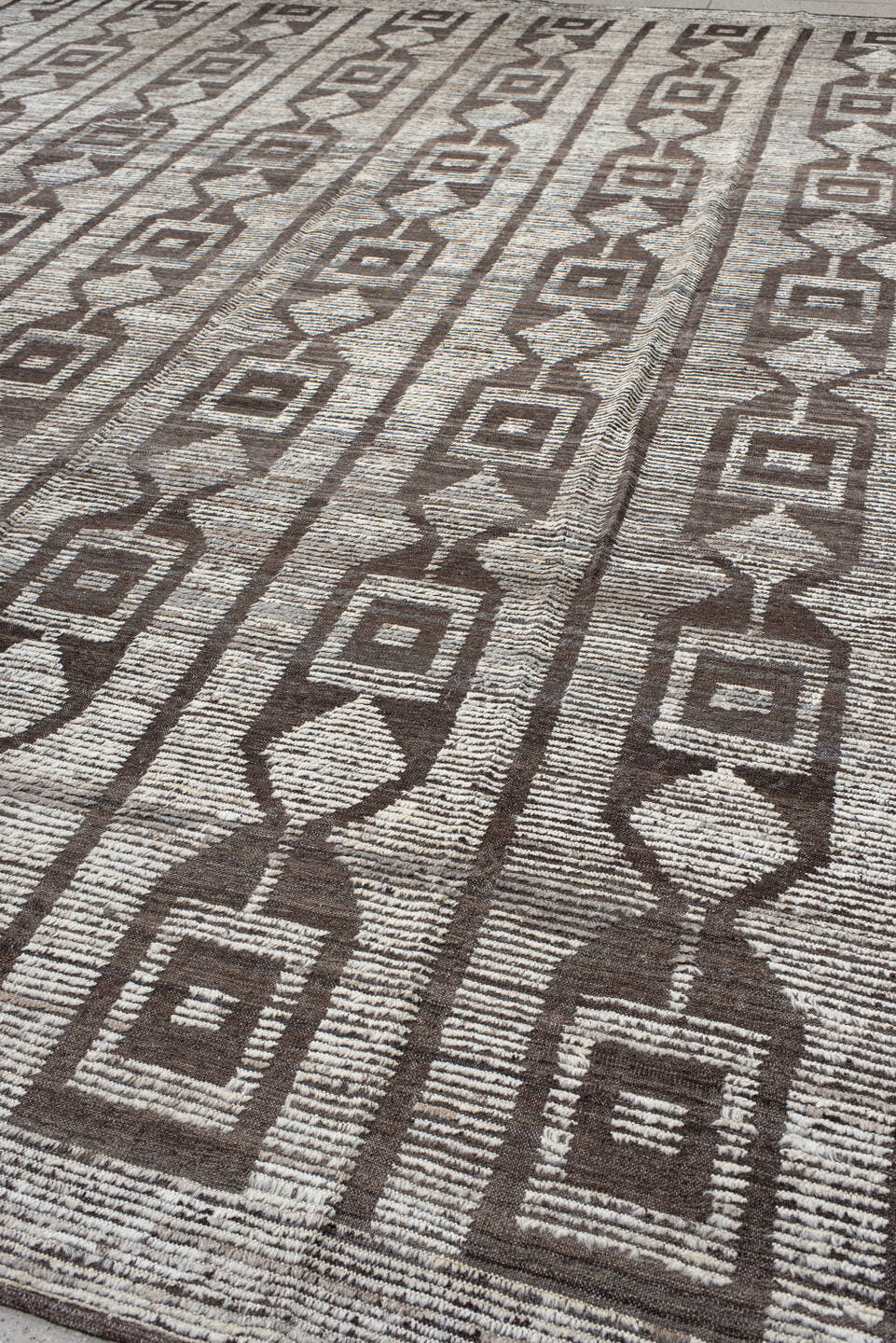 13' x 15' one-of-a-kind handmade vintage Tulu oversize rug. Color palette: ivory, brown, taupe, charcoal, beige, gray, black