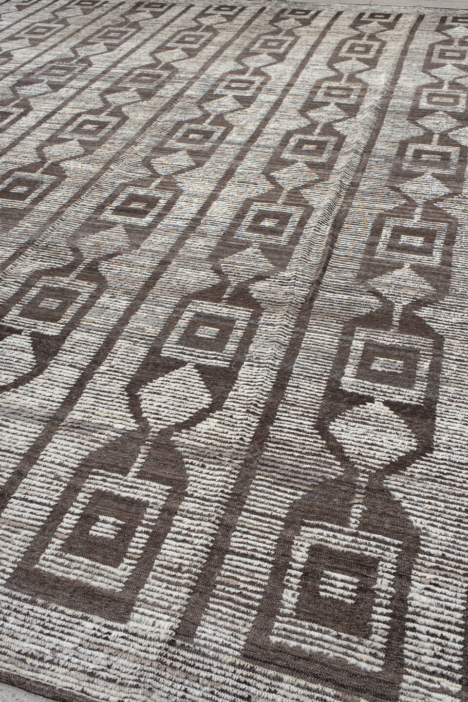 13' x 15' one-of-a-kind handmade vintage Tulu oversize rug. Color palette: ivory, brown, taupe, charcoal, beige, gray, black