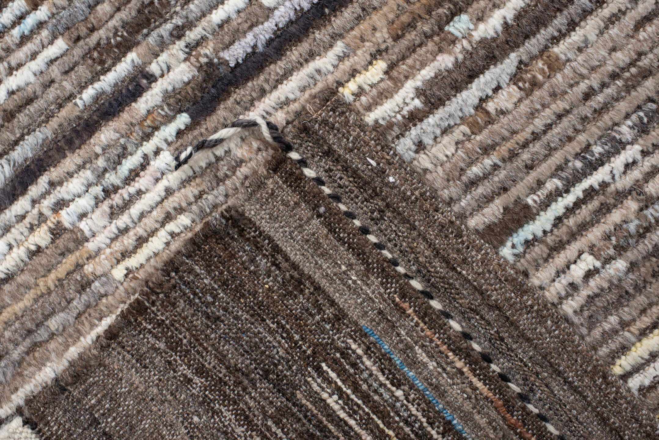 9' x 11' one-of-a-kind handmade vintage Tulu large size rug. Color palette: ivory, brown, charcoal, crimson, sky_blue, taupe