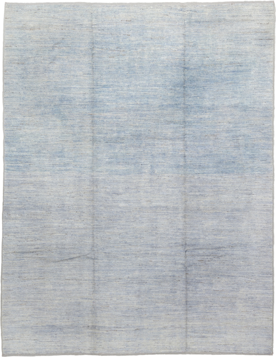 9' x 12' one-of-a-kind handmade vintage Tulu large size rug. Color palette: pale blue, ivory, silver, slate, light blue